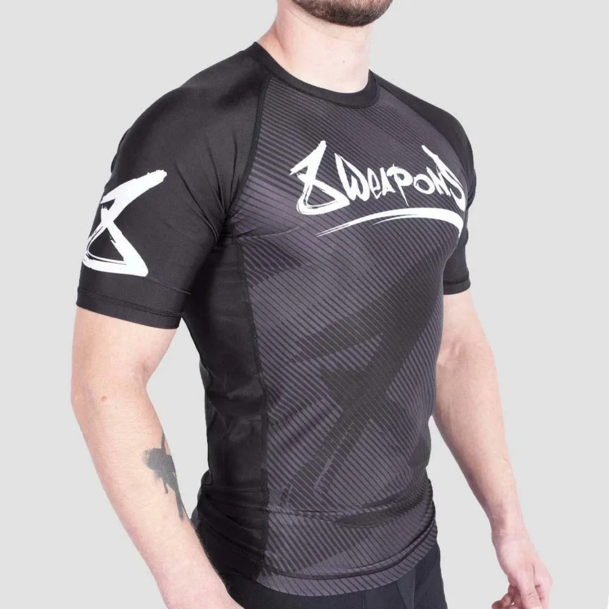 8 Weapons Strike Short Sleeve Rash Guard Black